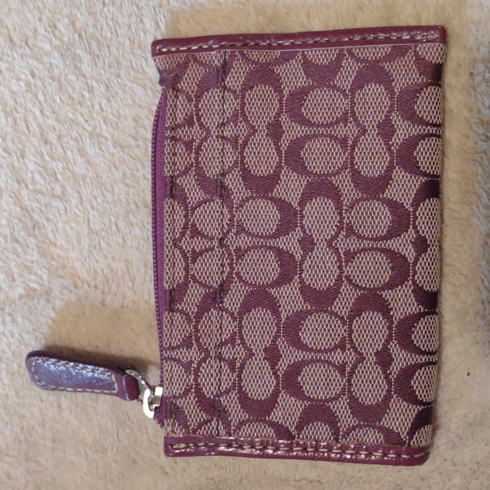 Purple coach mini change wallet